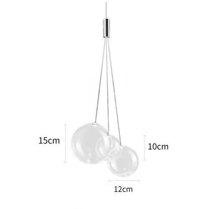 Modern chrome glass ball pendant light with two transparent glass spheres suspended by thin metallic cords for dining room decorbites glass ball chandelier