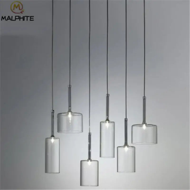 Modern chrome glass bottle pendant light with clear glass bottle shades and sleek chrome stems for dining room decorbites pendant light