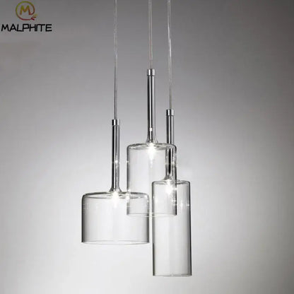 Modern chrome glass bottle pendant light with clear cylindrical glass shades and sleek metal stems for dining room decorbites glass bottle pendant design by malphite