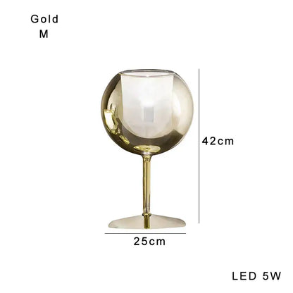 Modern chrome glass gold table lamp with reflective metallic finish and slender stem for luxury living room decorbites glass gold