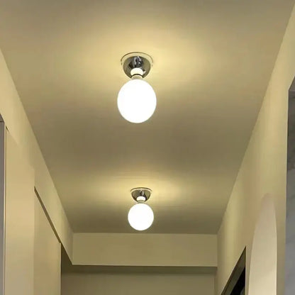 Two modern chrome glass iron led ceiling lights with frosted globes emit soft white glow for bedroom decorbites ceiling light