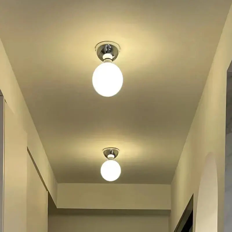 Two modern chrome glass iron led ceiling lights with frosted globes emit soft white glow for bedroom decorbites ceiling light