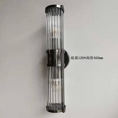 Modern chrome glass rod wall sconce with sleek black metal frame and clear vertical rods ideal for vanity lights