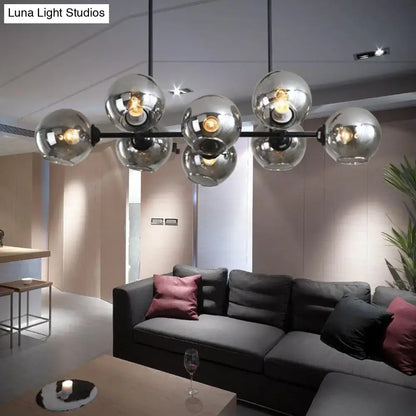 DecorBites modern black island lighting with chrome spherical hanging lamp kit and multiple glowing bulbs for living room