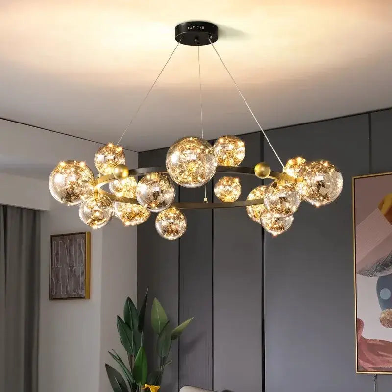 Modern chrome and gold decorbites crystal chandelier with clear glass spheres and warm lights for living room lighting