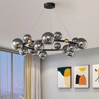 Modern chrome and gold decorbites crystal chandelier with sleek black frame for elegant living room lighting