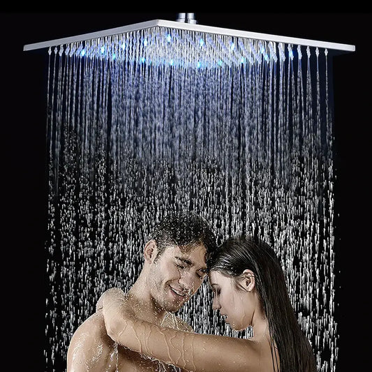 Modern chrome rainfall shower head with square chrome finish and blue led lighting multiple water streams