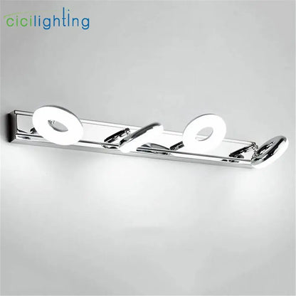 Modern chrome led vanity lamp with three circular illuminated elements for bathroom mirror lighting