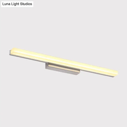 Modern chrome led wall light with streamlined metal shade in silver metal frame and warm white diffused illumination