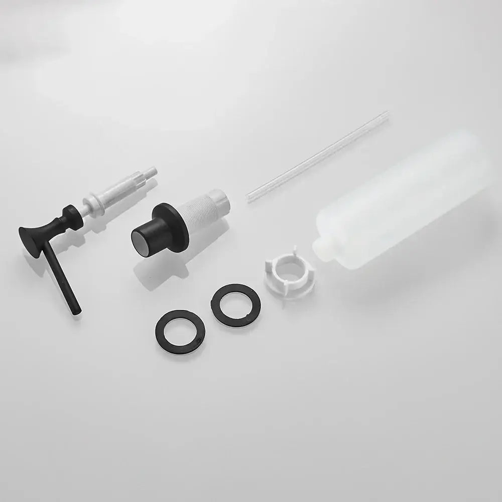 Modern chrome liquid soap dispenser with black and white plastic assembly and sleek flat top design for kitchen use