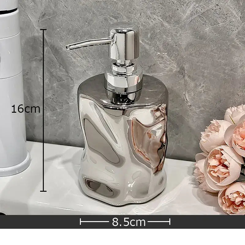 Shiny chrome soap dispenser with sculpted body and sleek pump from decorbites wrinkle ceramic soap set for bathroom decor