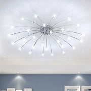 Modern chrome metal led chandelier starburst ceiling light with illuminated stars radiating from central hub for living room decorbites chrome metal led