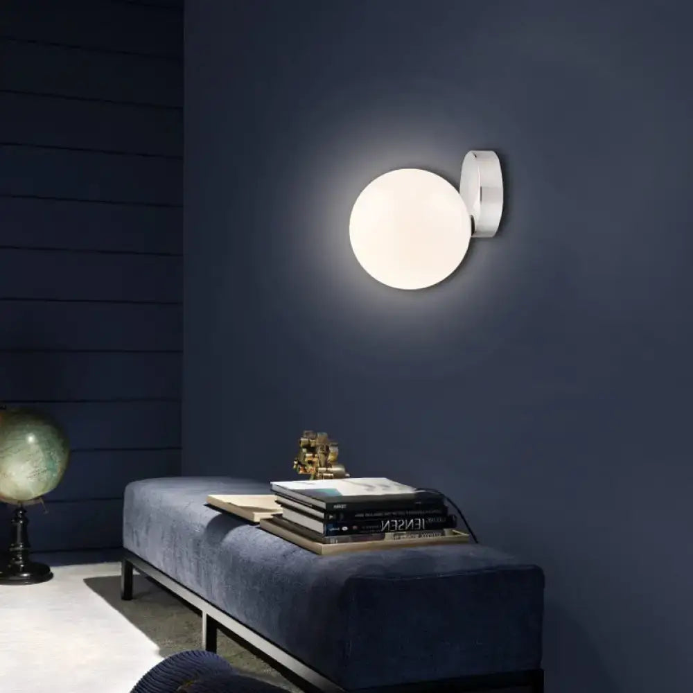 Modern chrome milk glass globe wall lamp with white spherical design as a wall mounted lamp for living room lighting
