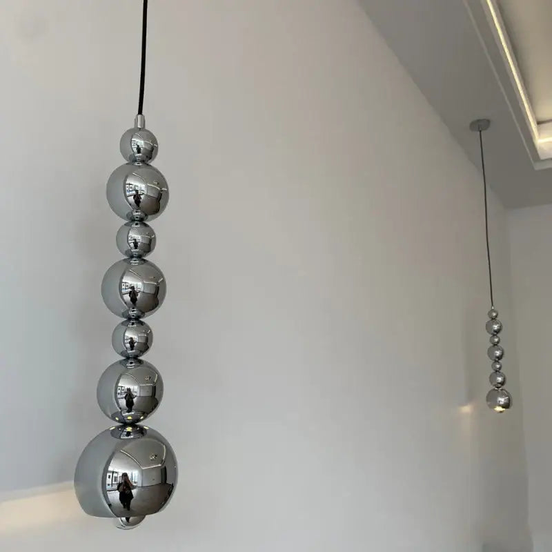 Modern chrome multi ball pendant light source with polished spherical beads for bedroom hanging lamp lighting