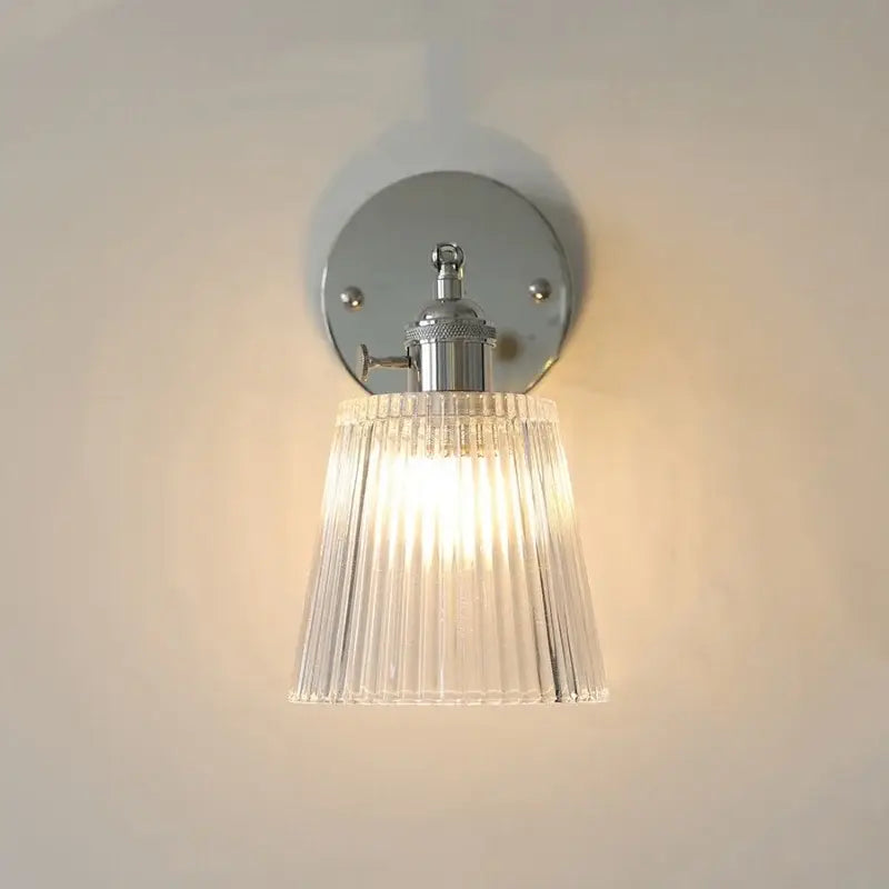 Modern chrome ribbed clear glass wall lamp with polished chrome mounting and pull chain for dining room decorbites clear glass