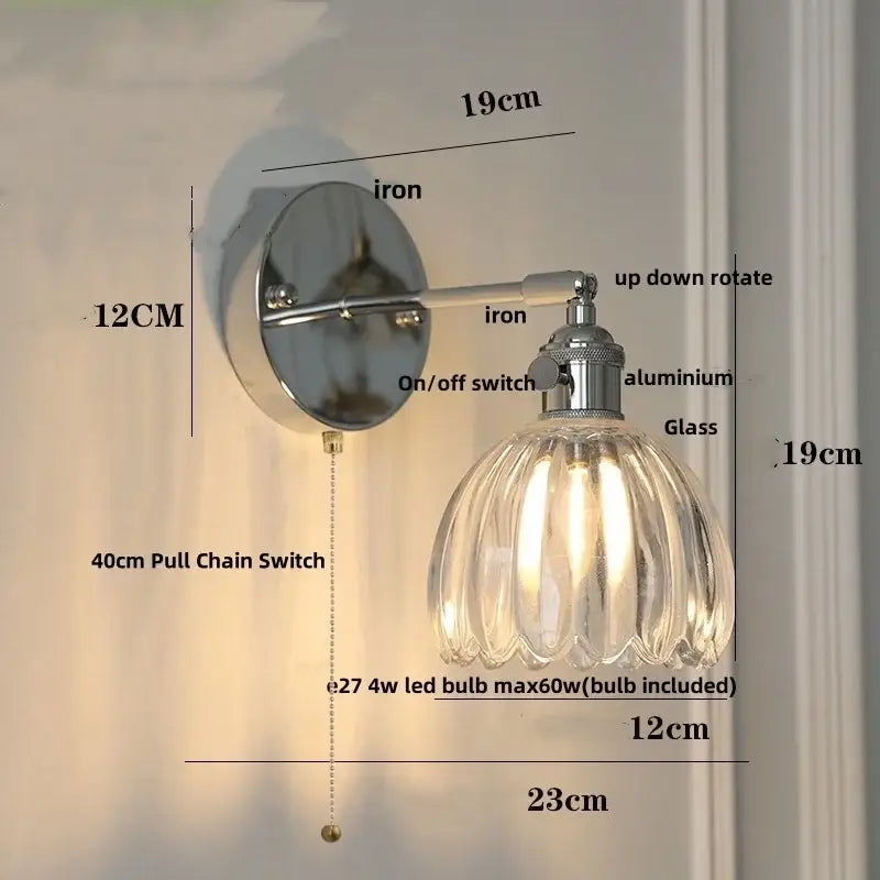 Vintage-style wall lamp with clear glass ribbed shade and polished iron bracket ideal for dining room decorbites clear glass