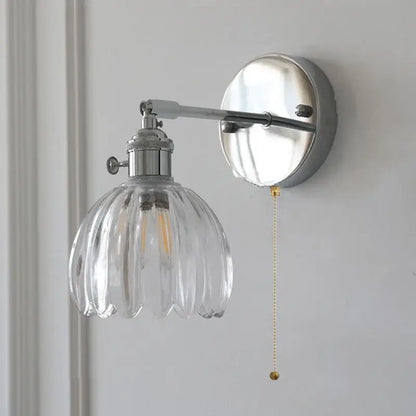 Modern chrome wall lamp with clear glass ribbed shade and metal arm for dining room decorbites clear glass design
