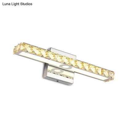 Modern chrome and silver champagne linear wall sconce with sleek chrome finish and yellow crystal accents for bathroom use