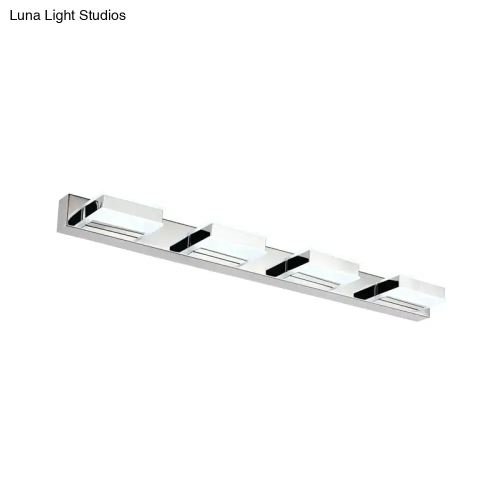 Modern chrome square acrylic vanity light bathroom fixture with four frosted glass panels and black trim highlighting fixture height