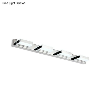 Modern chrome square acrylic vanity light bathroom fixture with four frosted glass panels and black trim highlighting fixture height