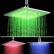Modern chrome square led rain shower head with sleek metallic finish and integrated green red blue illuminated water streams