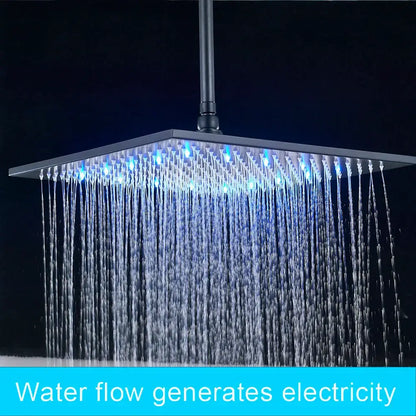 Modern chrome square led rainfall shower head with black finish and blue led lights emitting cascading water flow
