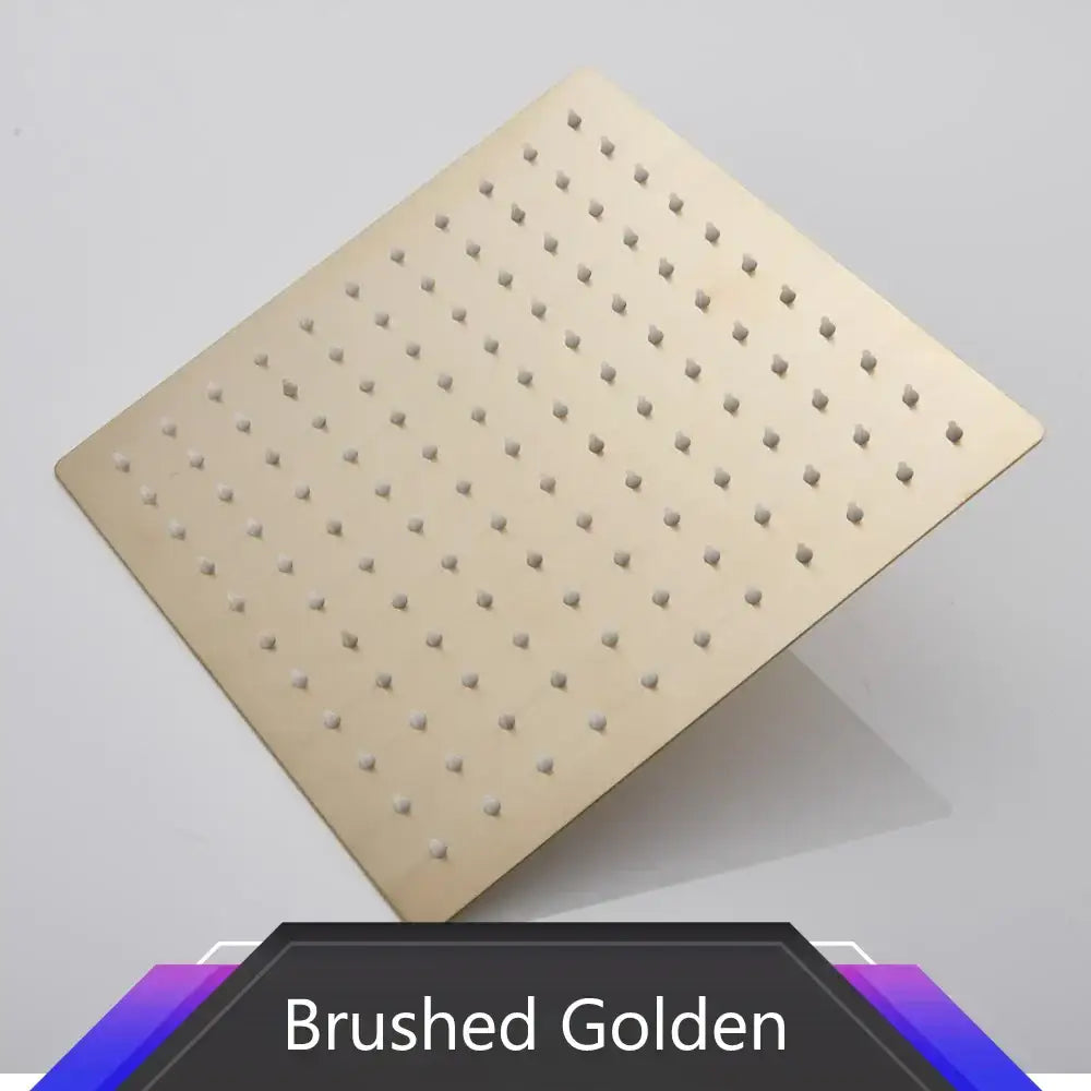 Brushed golden stainless steel rainfall shower head with square design and raised circular nozzles bathroom fixture