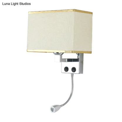 Modern chrome wall lamp with cream rectangular lampshade gold trim and adjustable gooseneck reading light for bedroom