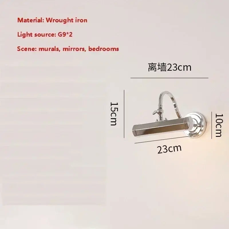 A sleek silver wrought iron wall light with adjustable arm for modern decorbites gold mirror headlight design
