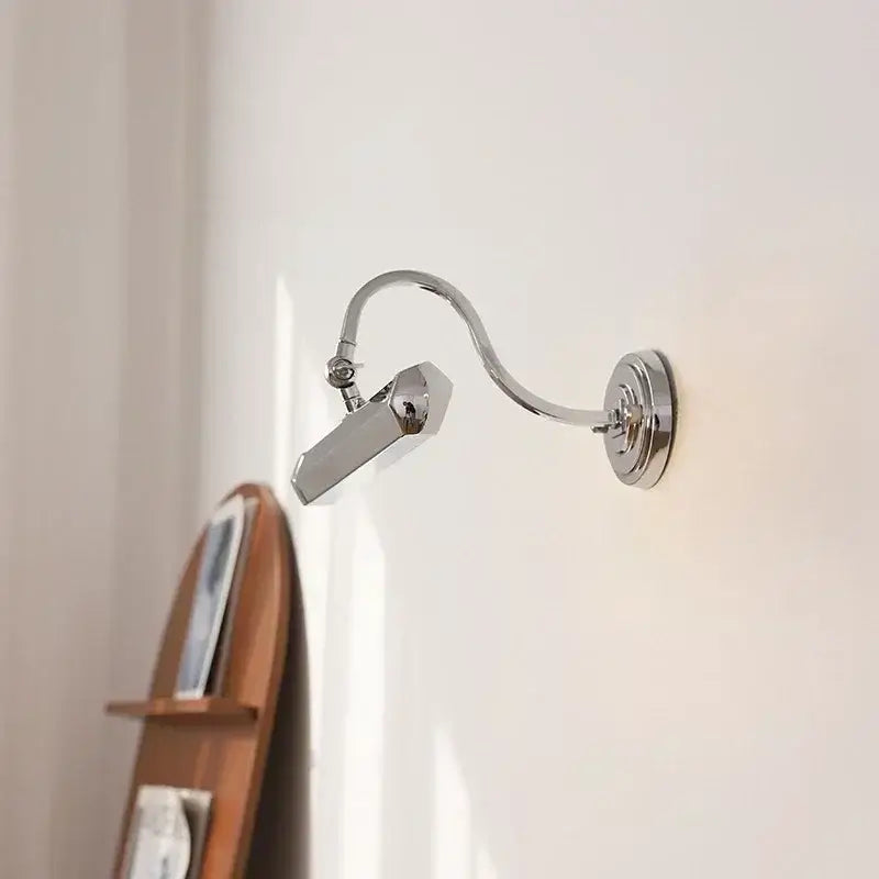 Chrome-finished adjustable wall light with sleek articulated arm and rectangular head for decorbites gold mirror headlight
