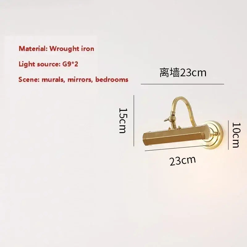 Brass-finished wrought iron wall light with curved arm and rectangular shade for modern decorbites gold mirror headlight