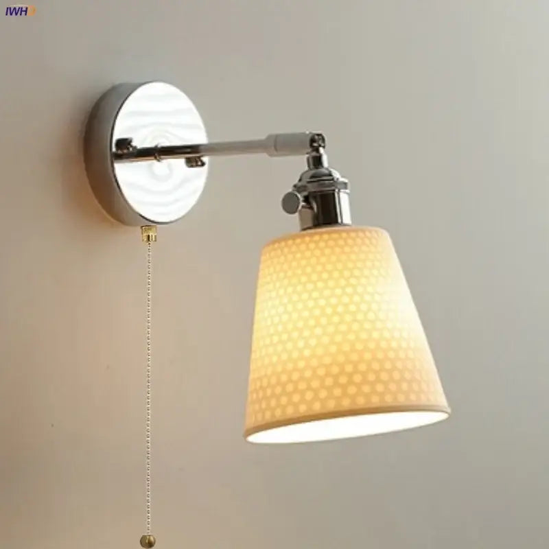 Modern chrome wall light with warm-toned perforated fabric shade and polished chrome arm by decorbites ceramic led
