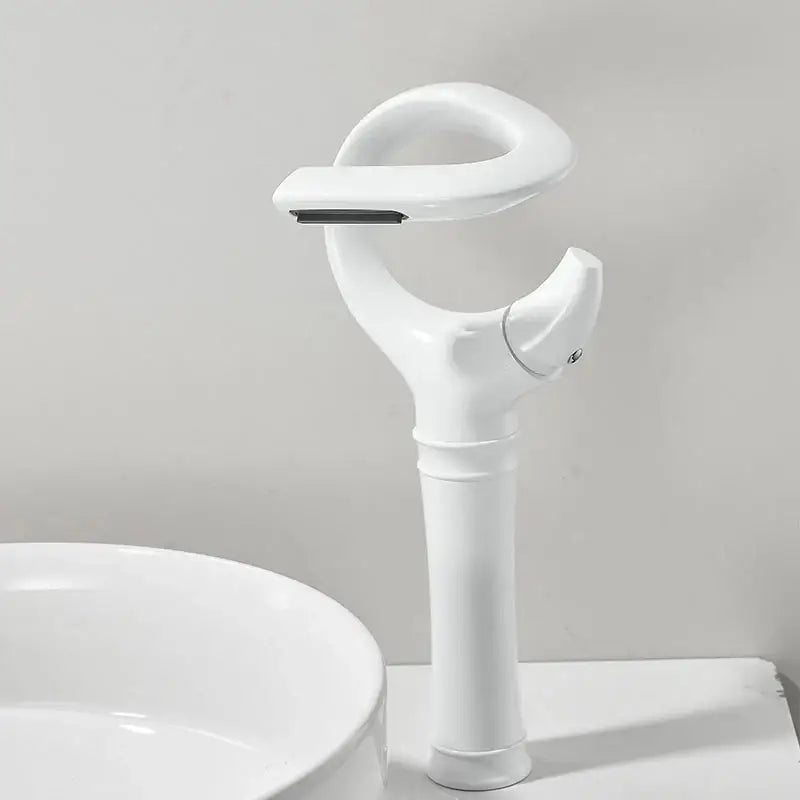 Modern white ceramic single handle mixer faucet with sleek curved spout for single hole cold water installation