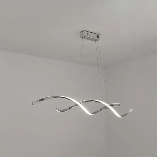 Modern chrome wave led island lighting with intertwined wave arms emitting bright white light for kitchen pendant use