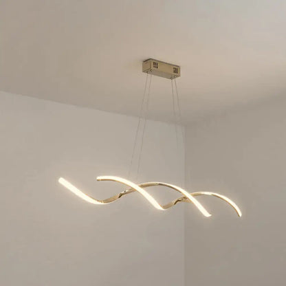 Modern chrome wave led island lighting with gold-toned curved design and warm ambient LED island lighting for kitchens