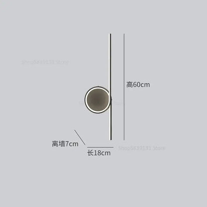 Minimalist modern circle straight bar wall lamp with cylindrical shade and matte black metal finish for bedroom and living room decorbites circle straight