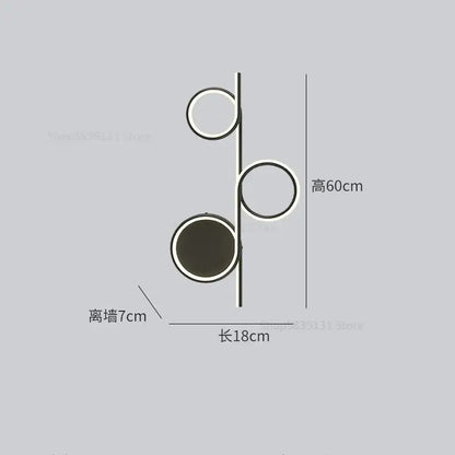 Modern minimalist wall lamp decorbites circle straight with three black and white rings on a slim metallic frame for bedroom and living room
