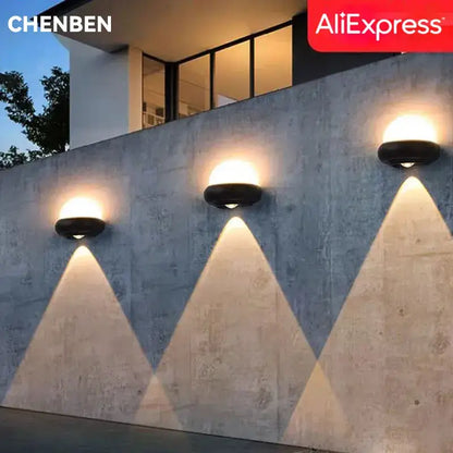 Modern circular black solar led wall light with warm white illumination for garden decorbites led wall light exterior use