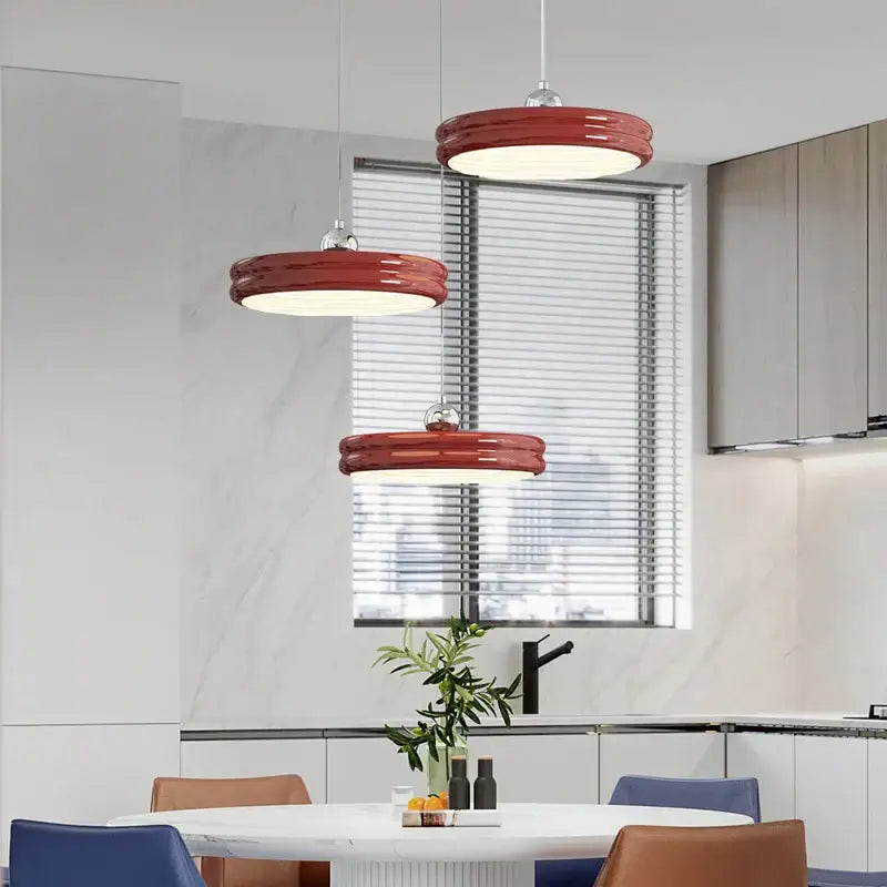 Three vibrant red circular modern chandelier pendant lights with glossy finish for dining room decorbites circular modern design