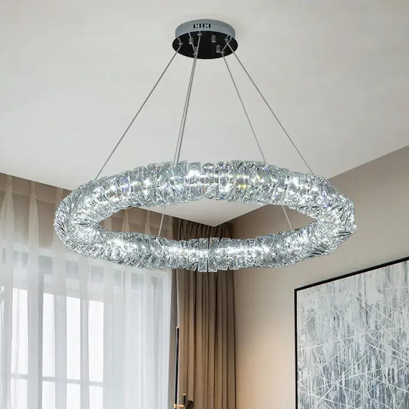 Modern circular textured crystal chandelier pendant light with shimmering silver frame and decorbites dimmable crystal elements