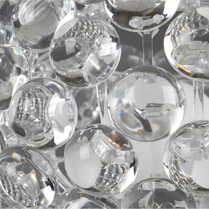 Modern clear bubble caboche led chandelier featuring faceted glass spheres with intricate cut patterns and reflective surfaces