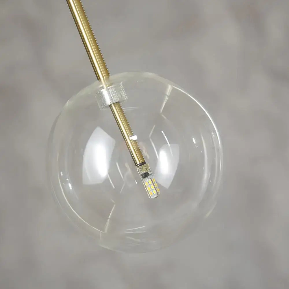Modern clear bubble glass ball pendant light with brass-finished rod and led bulb for kitchen decorbites bubble glass