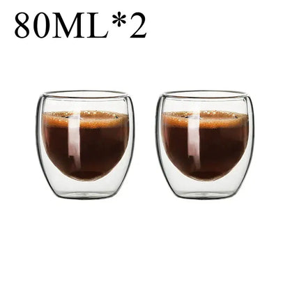 Modern clear double wall borosilicate glass espresso cups set with 80ml capacity filled with dark coffee