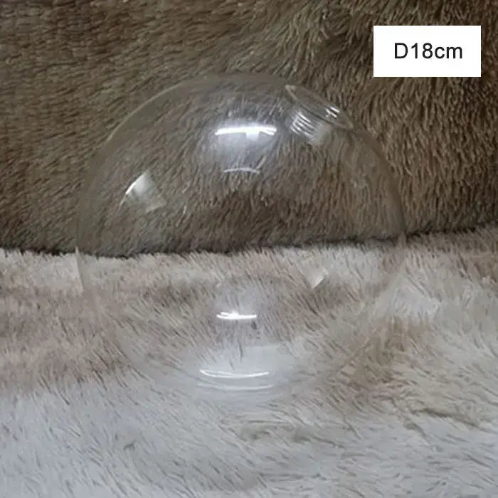 Modern clear plastic glass shade cover replacement with 18cm diameter resting on soft white and brown surface