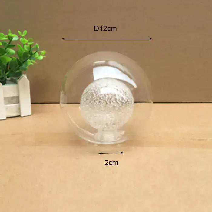 Modern clear and frosted glass shade cover replacement featuring a clear glass sphere with a textured white orb inside