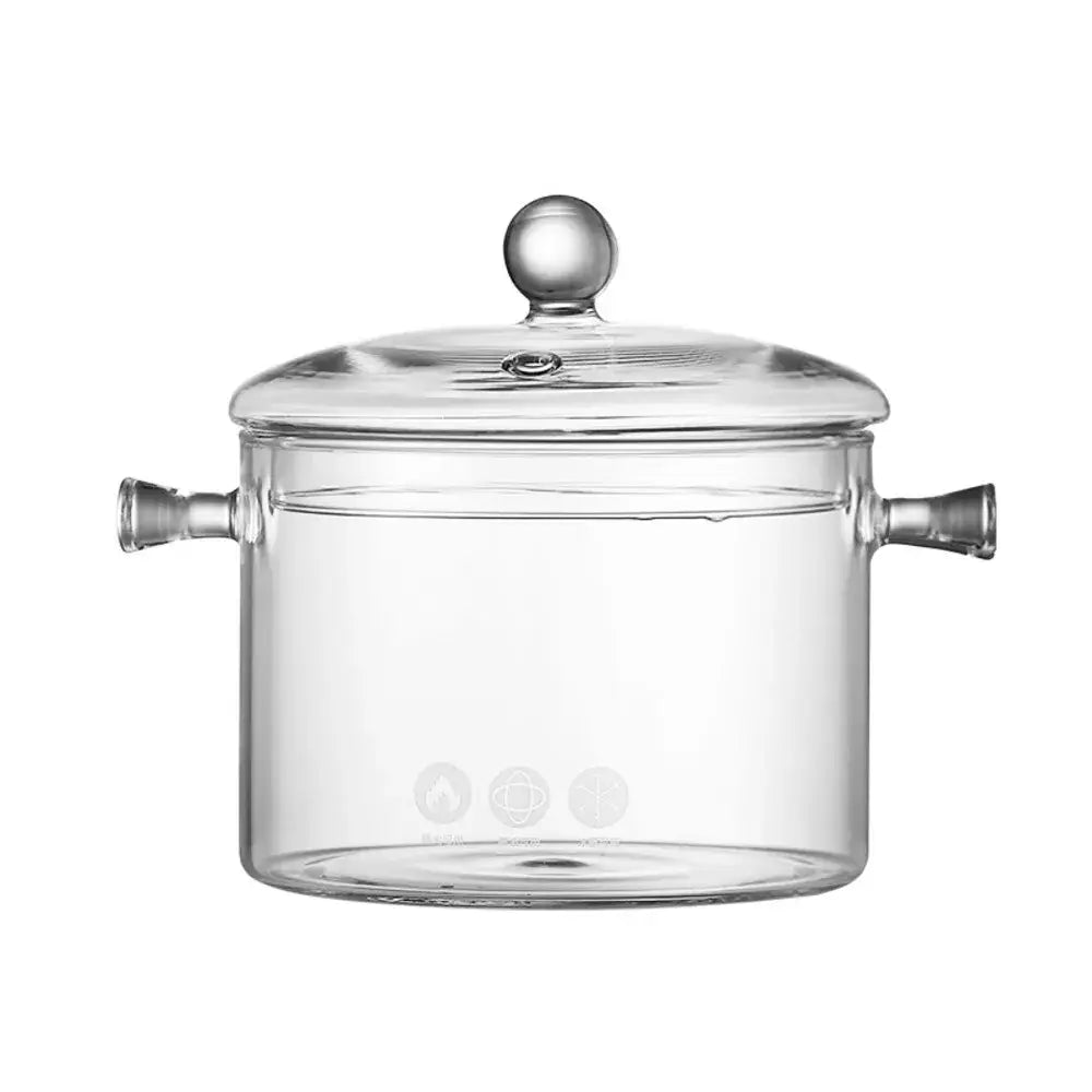 Modern clear glass cooking pot with silver handles a matching lid and rounded knob for efficient glass cooking