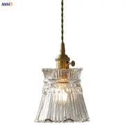 Modern clear glass copper pendant light with brass-finished socket and twisted cord by decorbites pendant light for kitchen decor
