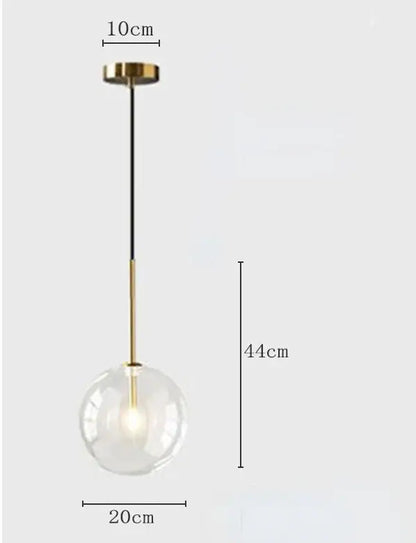 Modern pendant light with clear glass globe brass finish and black cord for kitchen rod suspension lighting