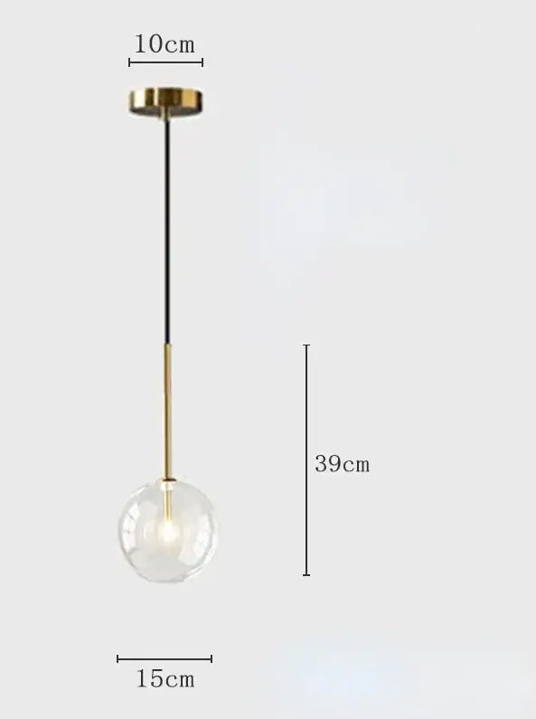 Modern pendant light with gold-toned metal fixture and transparent clear glass globe suspended by black cord