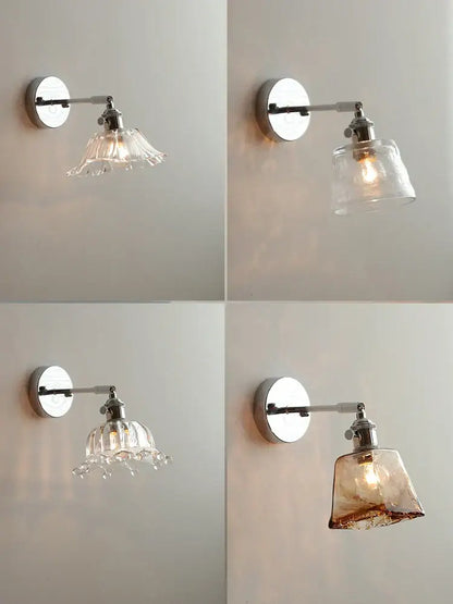 Set of four vintage-style wall lamps with chrome arms and decorbites clear glass shades in multiple designs